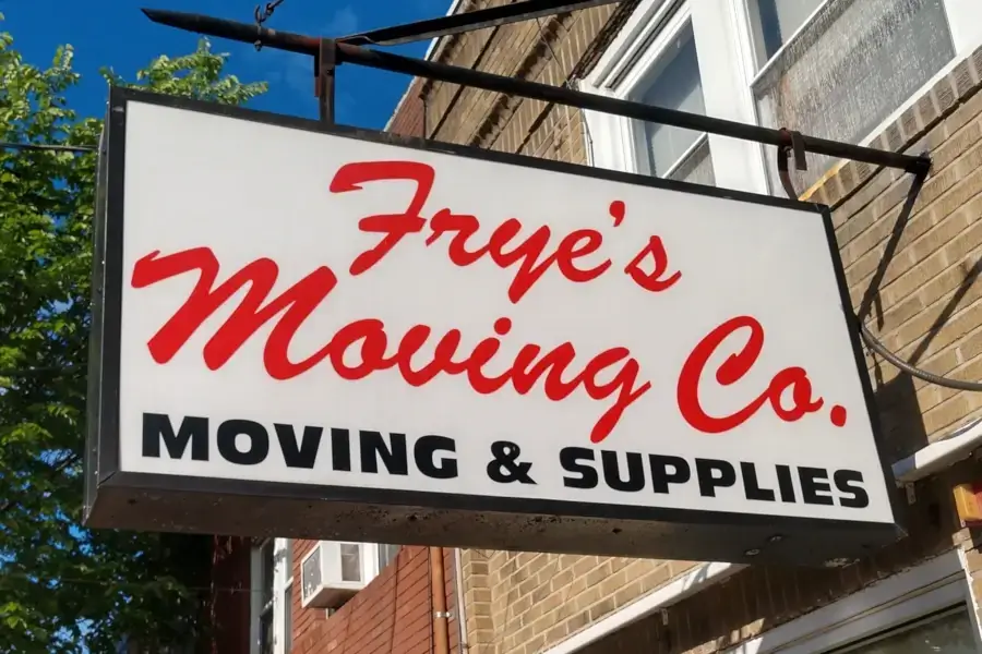 fryes moving store front sign Frye's Mowing Co. sign offering moving and supplies.