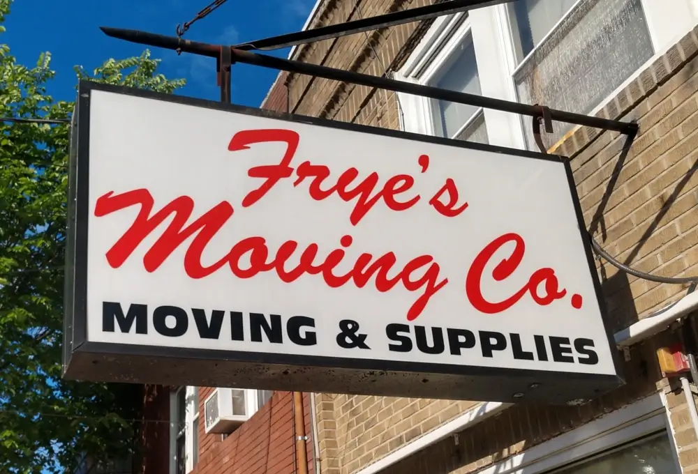 Frye's Moving Co. sign offering moving and supplies services.