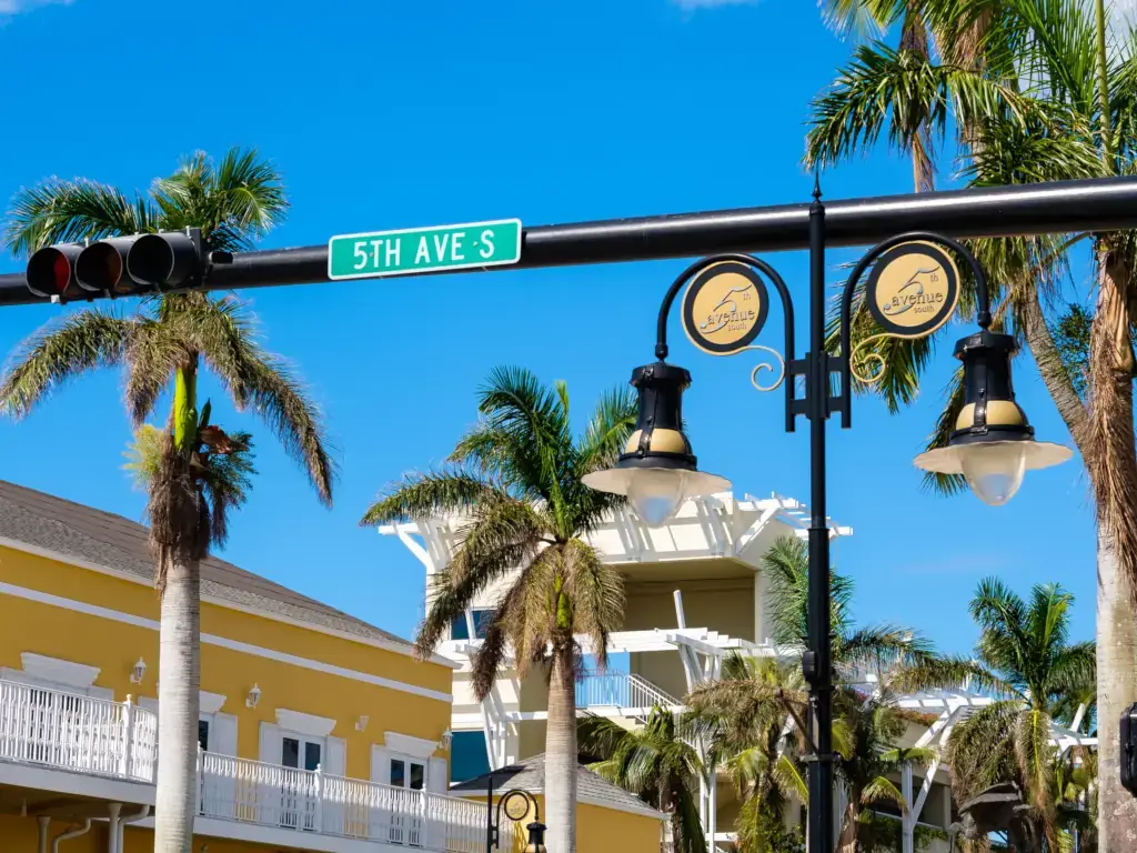 Fifth avenue street light – Naples, Florida Sunny day on scenic fifth avenue in the popular downtown district of Naples, Florida.