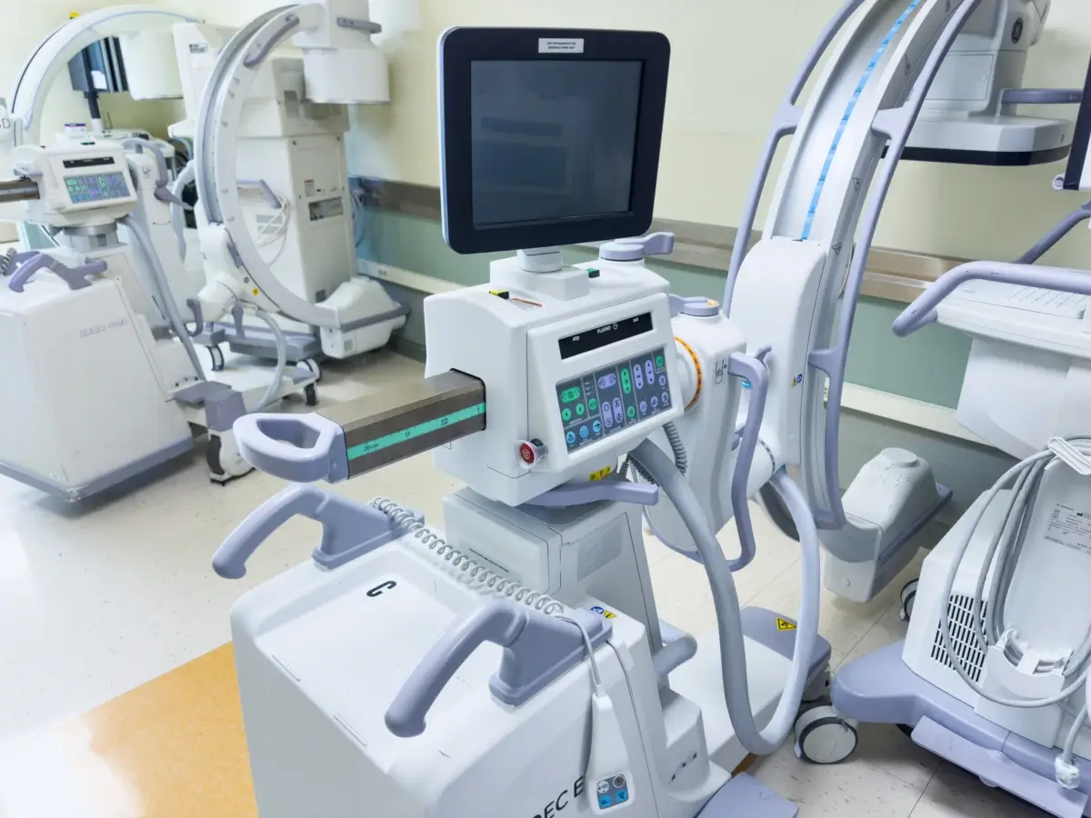 Modern medical imaging equipment in hospital room.
