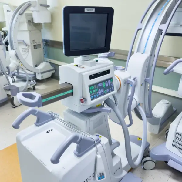 Advanced medical imaging equipment in hospital room.